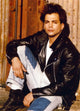 Richard Grieco seated in a black leather jacket photo print