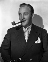 Bing Crosby posing in a tuxedo with a pipe on a white background - photo print
