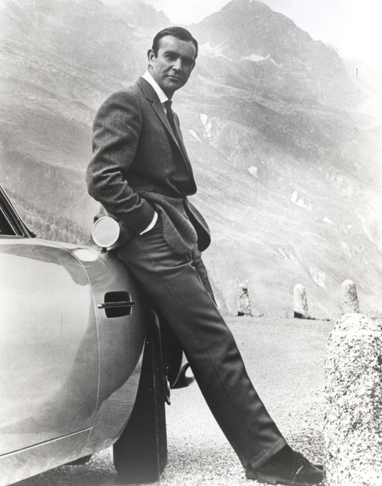 Sean Connery leaning on a car in Goldfinger photo print