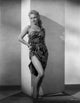 Virginia Mayo leaning in dress vintage photo print