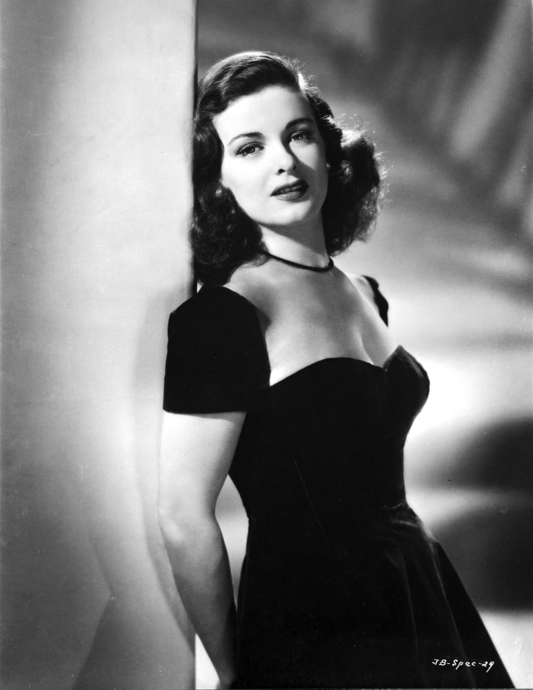 Joan Bennett portrait photo print leaning on a post in vintage style