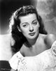 Gail Russell posed in white dress photo print.