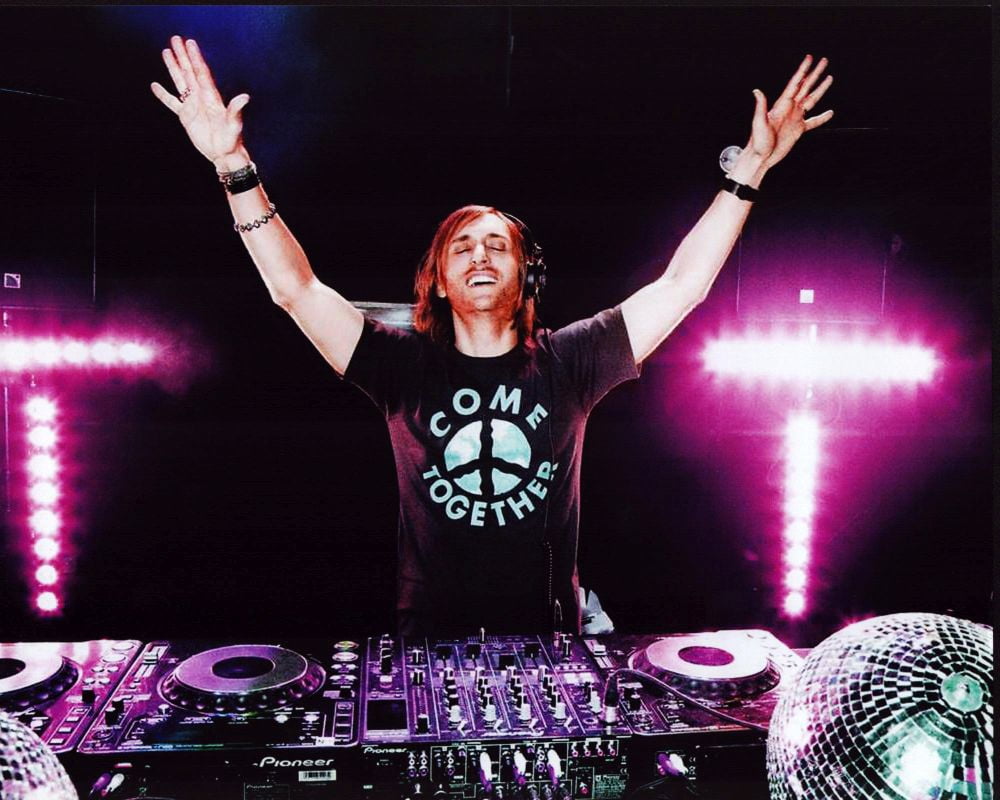 David Guetta photo print at DJ table, available in multiple sizes.