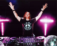 David Guetta photo print at DJ table, available in multiple sizes.