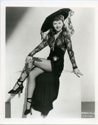 Barbara Stanwyck classic hat photo print showcasing vintage Hollywood elegance.
