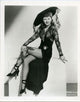 Barbara Stanwyck classic hat photo print showcasing vintage Hollywood elegance.