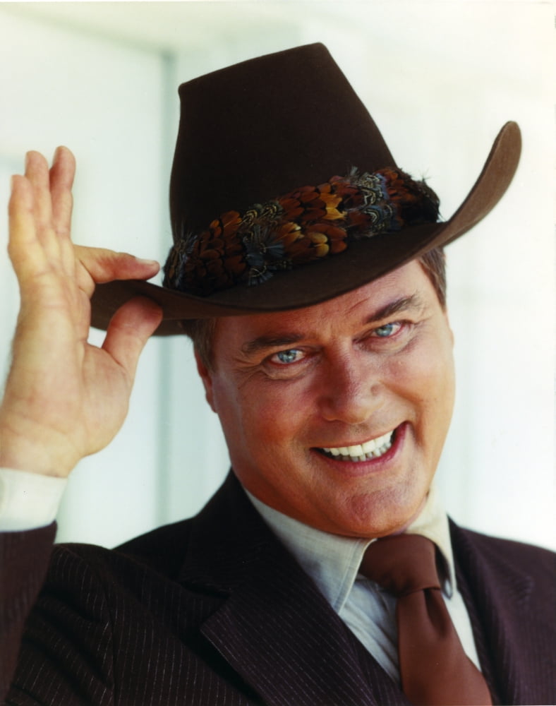 Larry Hagman smiling in brown coat photo print