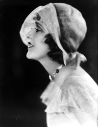Ruth Roland posed side view photo print with black background.