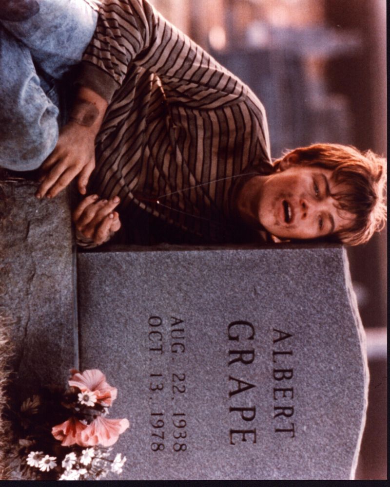 Leonardo DiCaprio leaning on headstone photo print from What's Eating Gilbert Grape