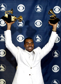 Kanye West in the press room at the 47th Annual Grammy Awards photo print by Emilio Flores