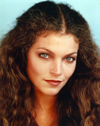 Close-up portrait photo print of Amy Irving smiling.
