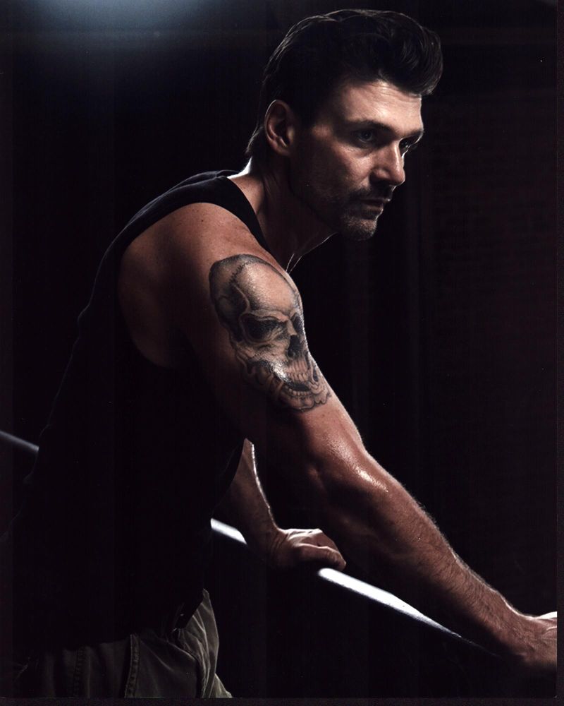 Frank Grillo leaning on railing photo print in tank top