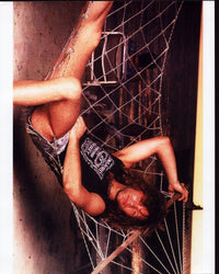 Jon Bon Jovi lounging in a hammock photo print.
