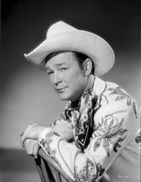 Roy Rogers posed in floral shirt and cowboy hat photo print.