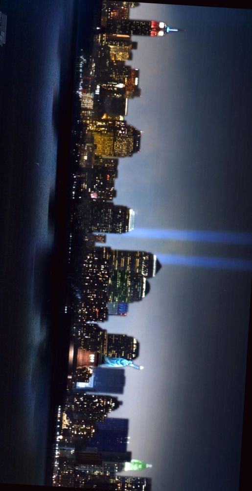 New York City skyline at night with Twin Tower memorial beams photo print