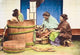 Vintage Meiji era poster print of a man bathing in a barrel.