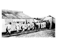 WWI photograph of troops at a disinfecting plant in England.