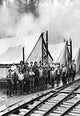 Darius Kinsey Lumber Industry Poster Print showcasing vintage photography of loggers in Washington State.