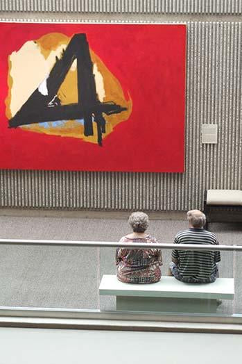 Poster print of two sculpted figures admiring a Rothko painting at Palm Springs Art Museum.
