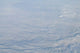 Clouds viewed from above airplane window poster print by Jason Pierce.