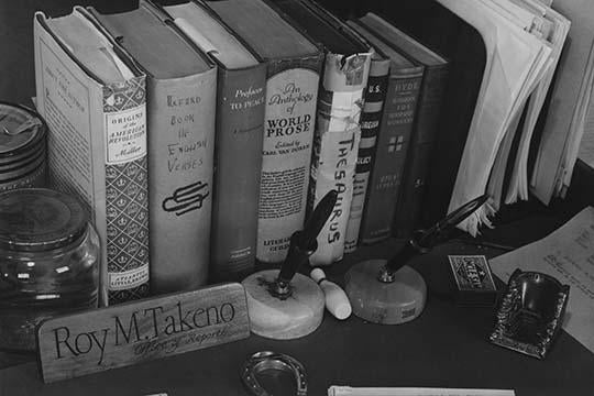 Desk Still Life Poster Print featuring books, fountain pens, and matches by Ansel Adams.