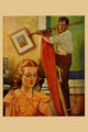 Wife Sews While a Man Hangs a Picture art print by Home Arts.