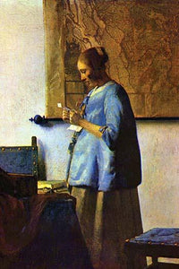 Vintage art print of a young girl reading a letter by Johannes Vermeer.
