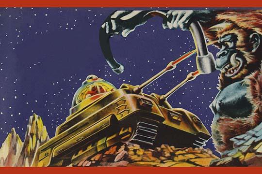 Vintage tin toy box art featuring a space tank attacking a gorilla.