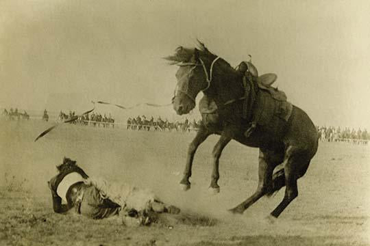 Wild West Frontier Days rodeo poster print featuring a cowboy on a bucking bronco.