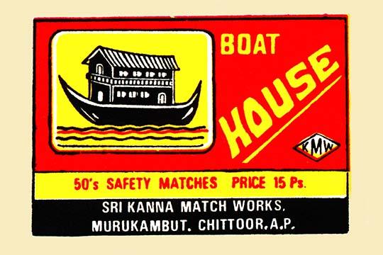 Vintage matchbox poster print showcasing colorful designs and artistry.