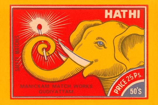 Hathi the Elephant holding a lit match in his trunk match box poster print