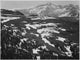 Long's Peak snow-covered mountain poster print by Ansel Adams.
