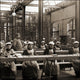 Factory Girls at Work under the Eyes of a Watchful Supervisor Poster Print