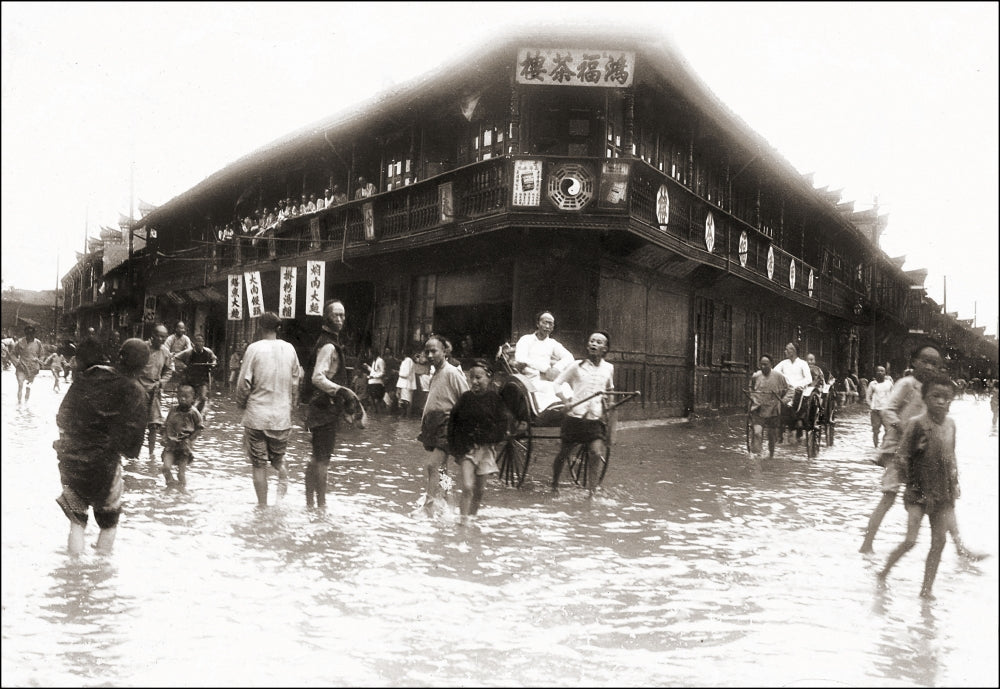 Poster print of people wading in water along the streets in China in front of Great Fortune Tea House.