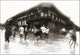 Poster print of people wading in water along the streets in China in front of Great Fortune Tea House.