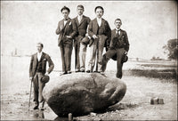 Young Men Stand on a Boulder Poster Print showcasing youth and adventure.