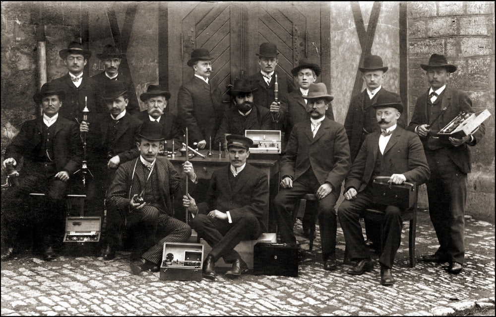 Inventive Men Get a Charge from Electrical Devices Poster Print featuring innovative electrical devices.