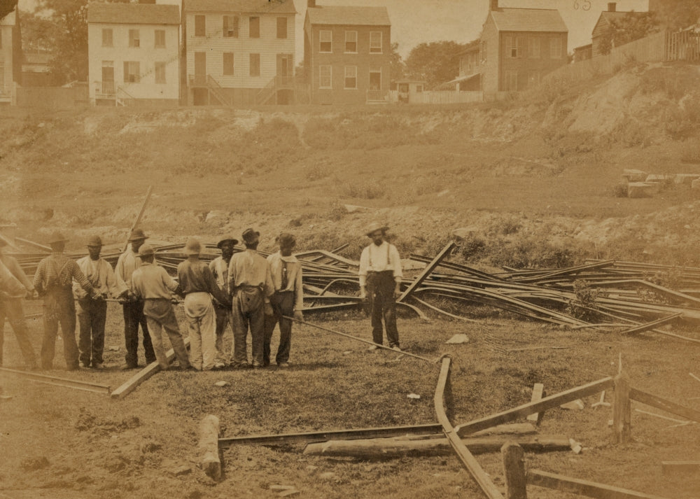 Railroad construction workers straightening track poster print.