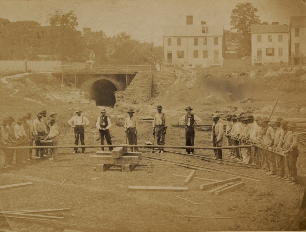 Railroad construction workers straightening track poster print