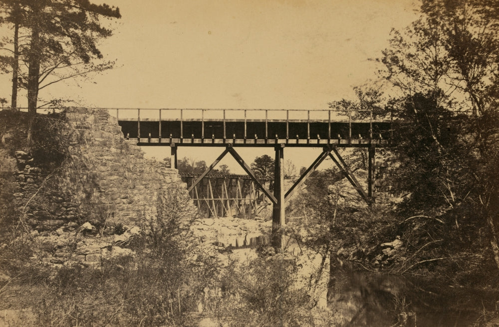 Two Trestle Bridges Over a Creek Poster Print showcasing serene natural beauty.