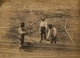 Two railroad construction workers hammering tracks poster print.