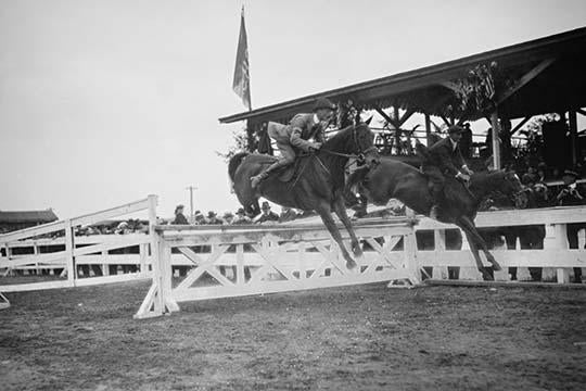 Horse Show in Washington DC Poster Print featuring horses jumping fences.