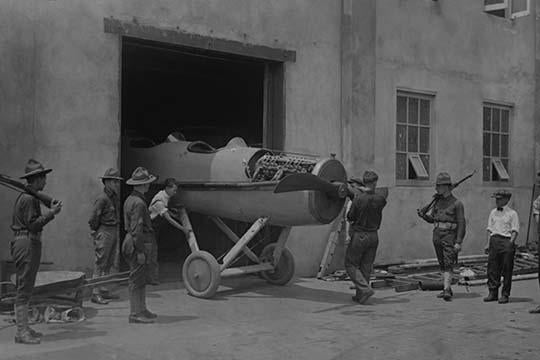 Fighter Aircraft Manufacturing Plant poster print showcasing a historic aircraft being moved from the manufacturing plant.