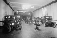 Automobiles and trucks on display under American flag banners poster print.