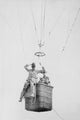 Balloon Jump Poster Print featuring a parachutist in action.