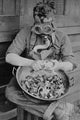 Soldier wearing gas mask to avoid crying over onions poster print
