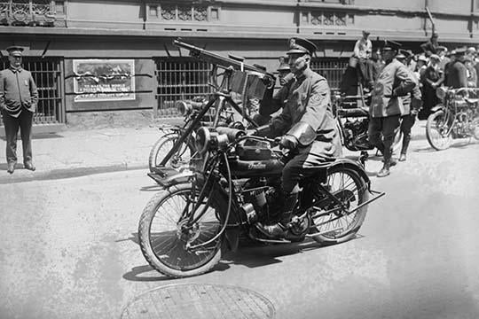Cop Rides a Police Mobile Motorcycle Machine Gun Poster Print