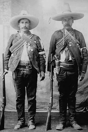 Pancho Villa's Men Urbino & Iluarte poster print featuring soldiers with rifles and bandoliers.