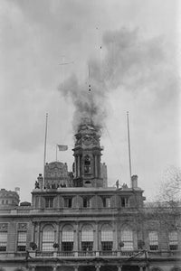 New York City Hall Tower Fire Escape Poster Print depicting firefighters and people escaping from a burning building.