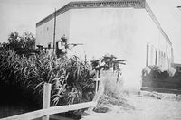 Mexican Battle of Juarez poster print featuring Insurrectos firing rifles on irrigation ditch.
